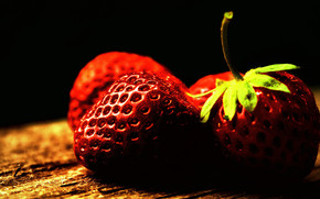 Two ripe strawberries