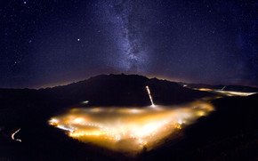 Foggy Valley with Milky Way wallpaper