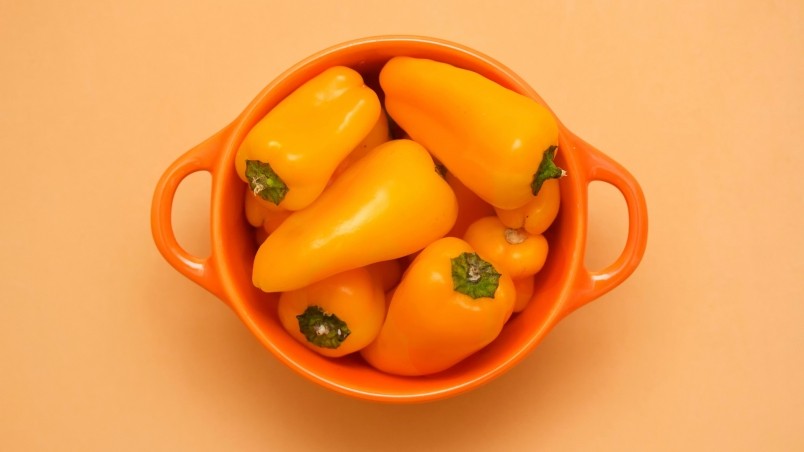 Cup of Yellow Peppers wallpaper