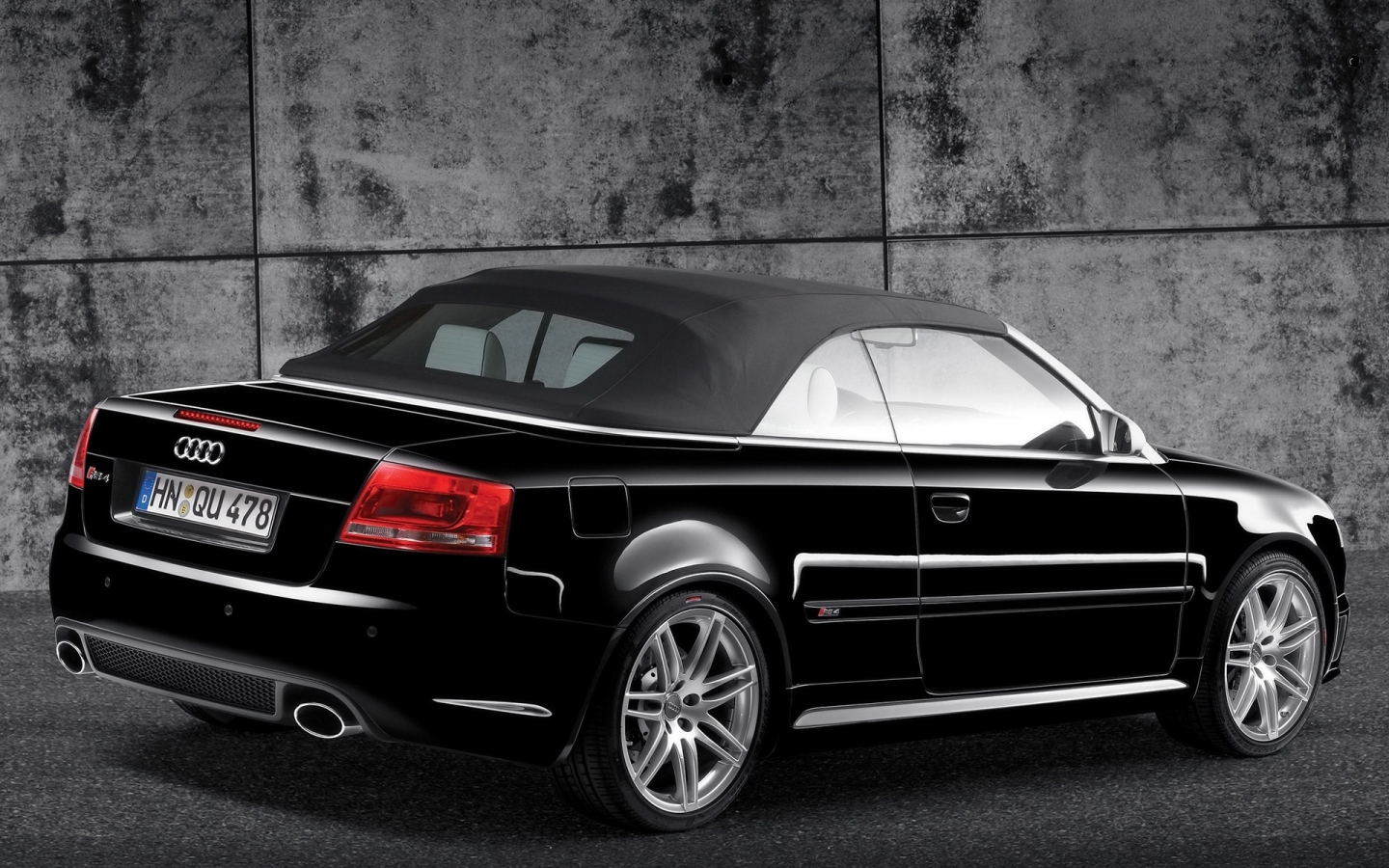 Audi RS 4 Cabriolet Black Rear And Side 2008 for 1440 x 900 widescreen resolution