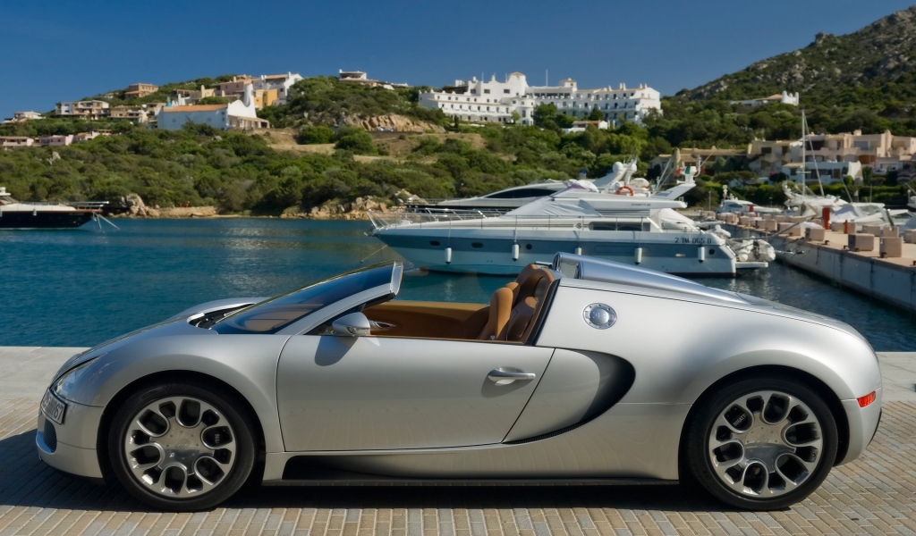 Bugatti Veyron 16.4 Grand Sport in Sardinia 2010 - Side for 1024 x 600 widescreen resolution
