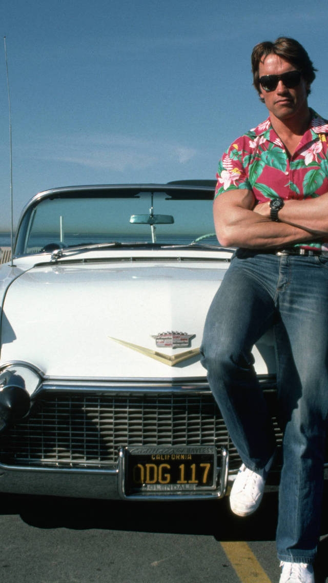 Cadillac and Arnold Schwarzenegger for 640 x 1136 iPhone 5 resolution