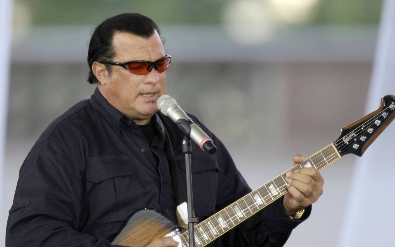 Steven Seagal Singing for 1280 x 800 widescreen resolution
