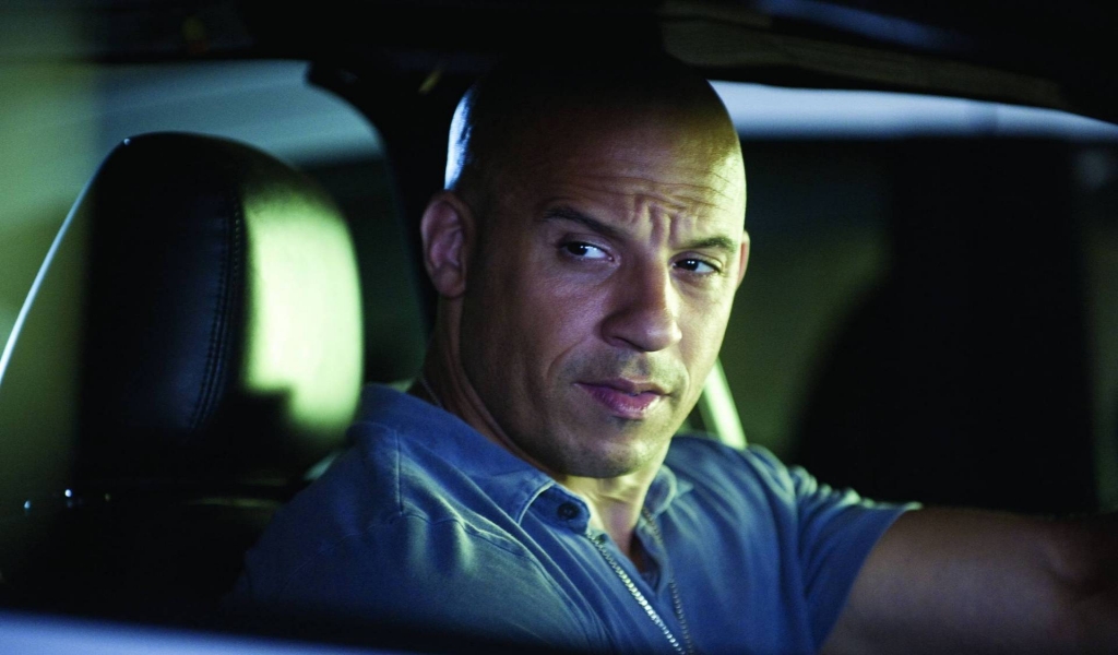 Vin Diesel in Car for 1024 x 600 widescreen resolution