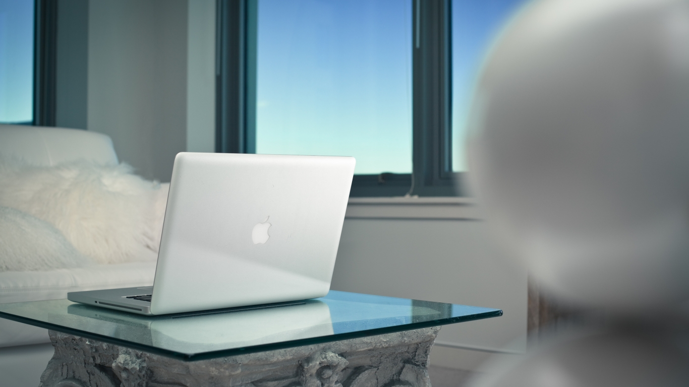 White MacBook Pro for 1366 x 768 HDTV resolution