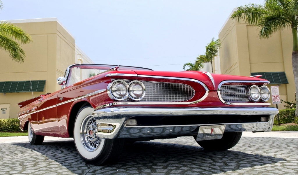 1959 Red Pontiac Cabrio for 1024 x 600 widescreen resolution