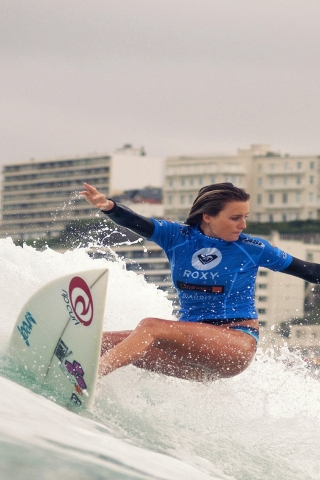 Alana Blanchard Surfing for 320 x 480 iPhone resolution