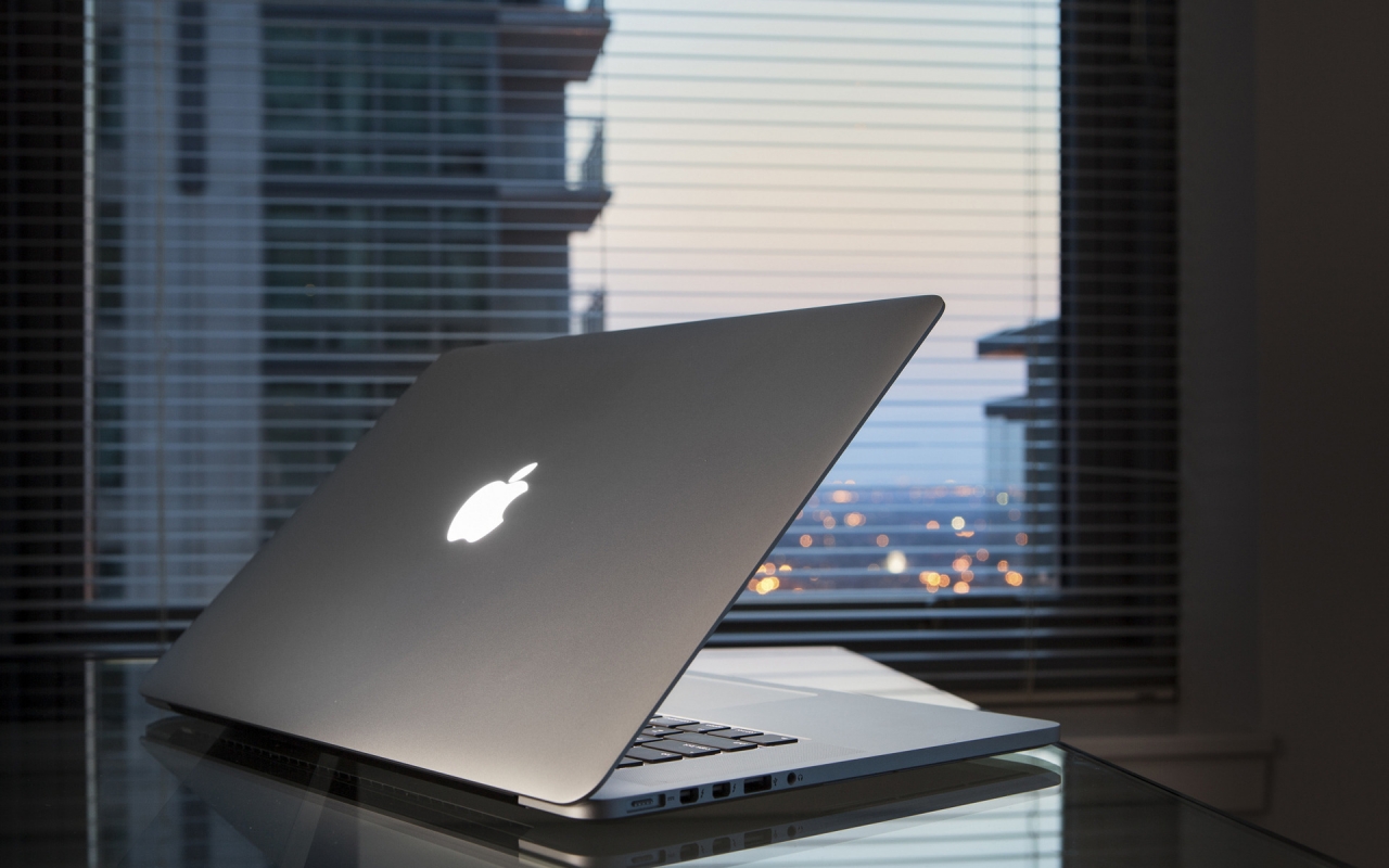 Apple MacBook On Desk for 1280 x 800 widescreen resolution