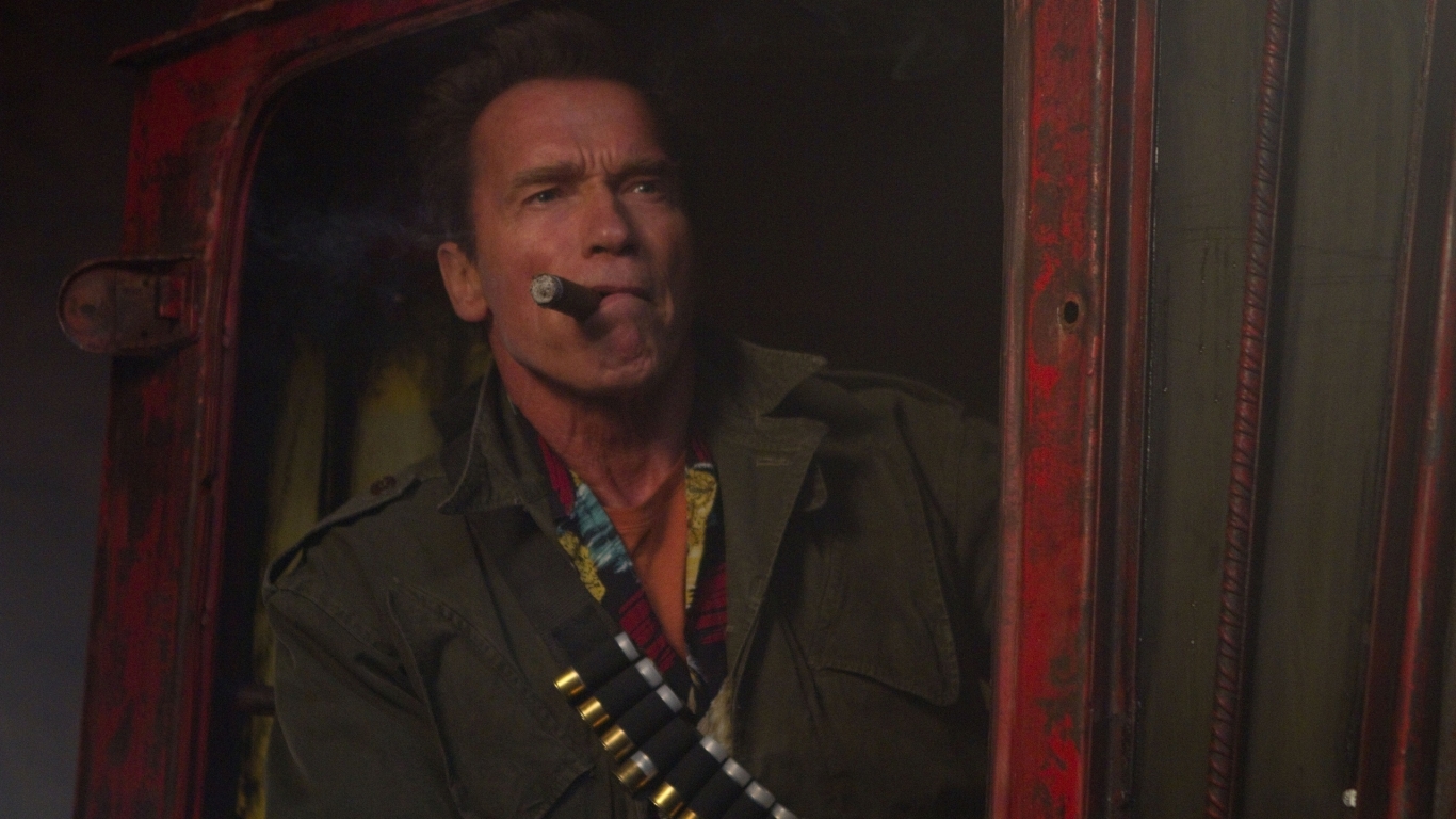 Arnold Schwarzenegger Cigar for 1366 x 768 HDTV resolution
