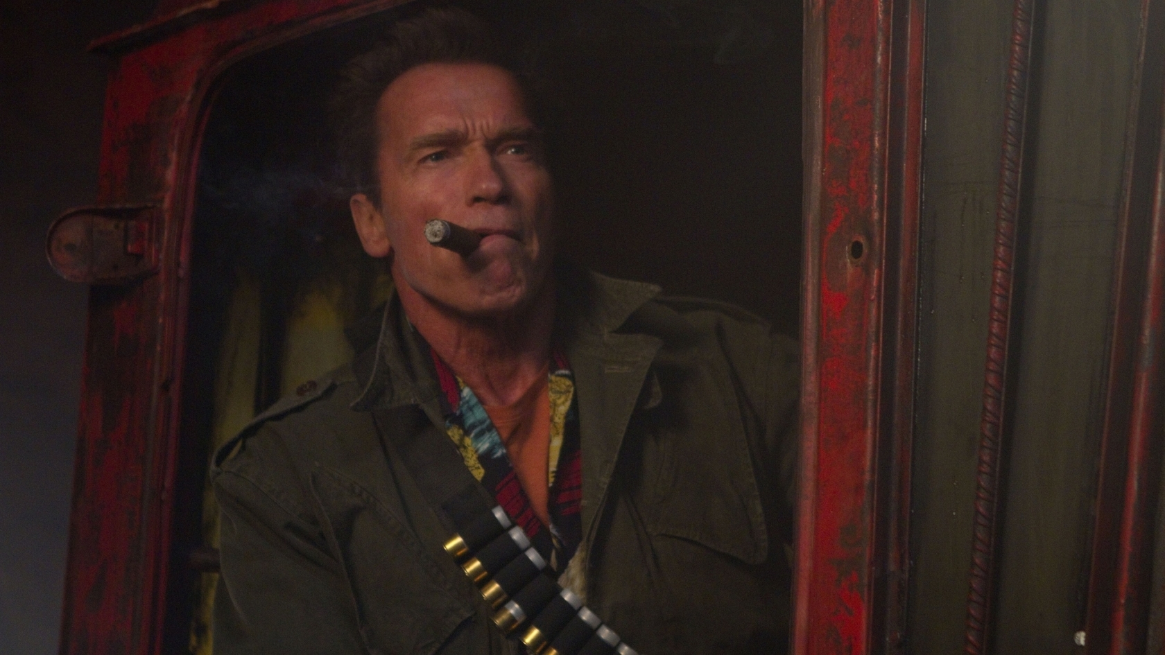 Arnold Schwarzenegger Cigar for 1680 x 945 HDTV resolution