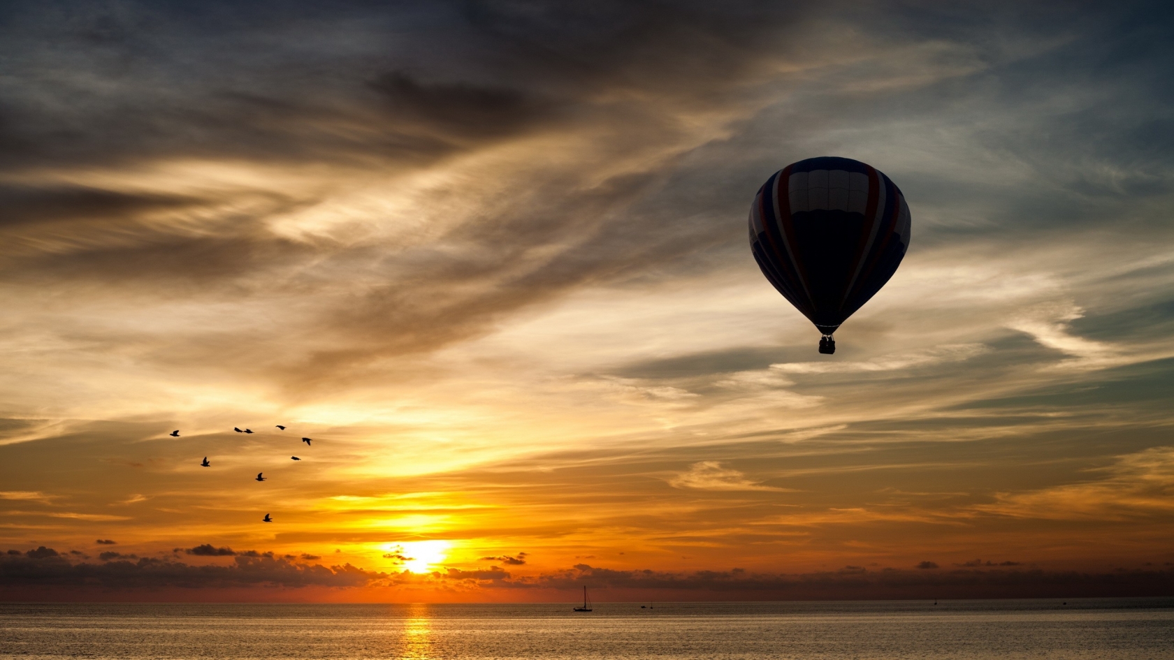 Balloon Towards Sunset for 1680 x 945 HDTV resolution