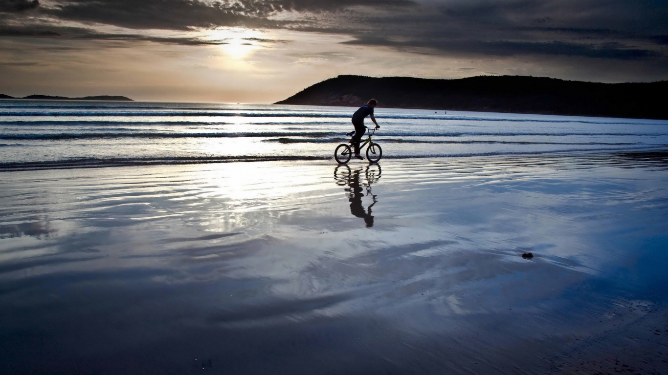 Biking on the Beach for 1366 x 768 HDTV resolution