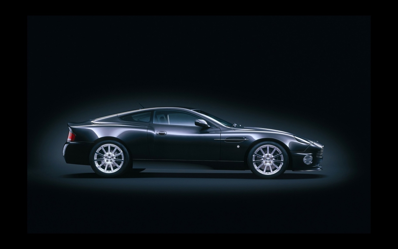 Black Aston Martin Vanquish for 1280 x 800 widescreen resolution