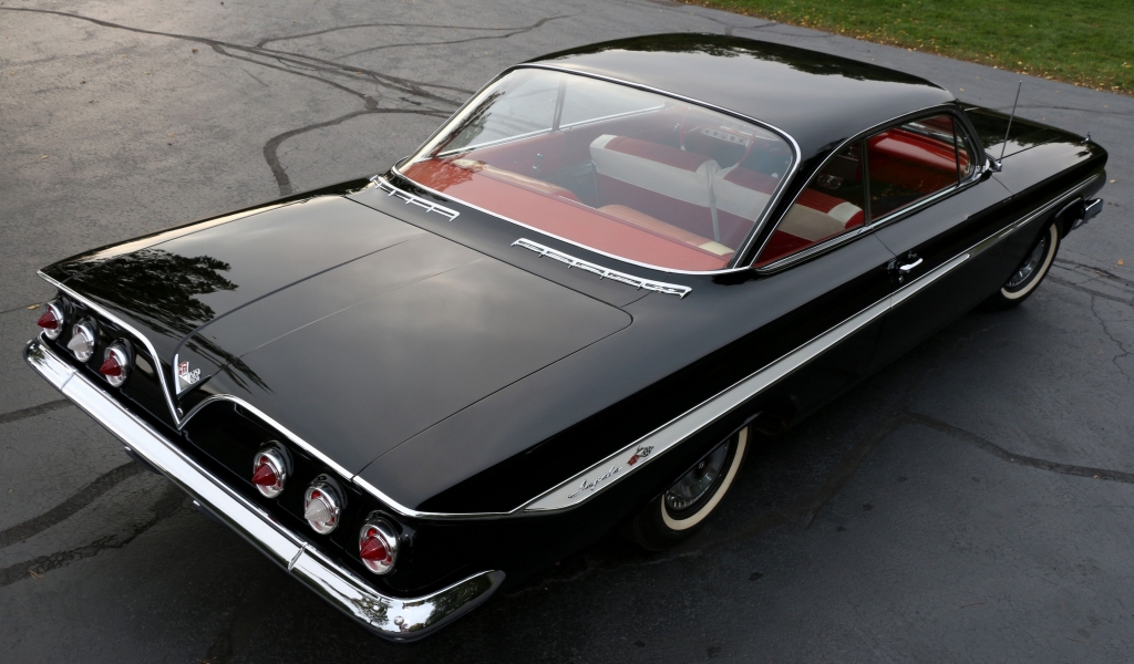 Black Chevrolet Impala 1961 for 1024 x 600 widescreen resolution