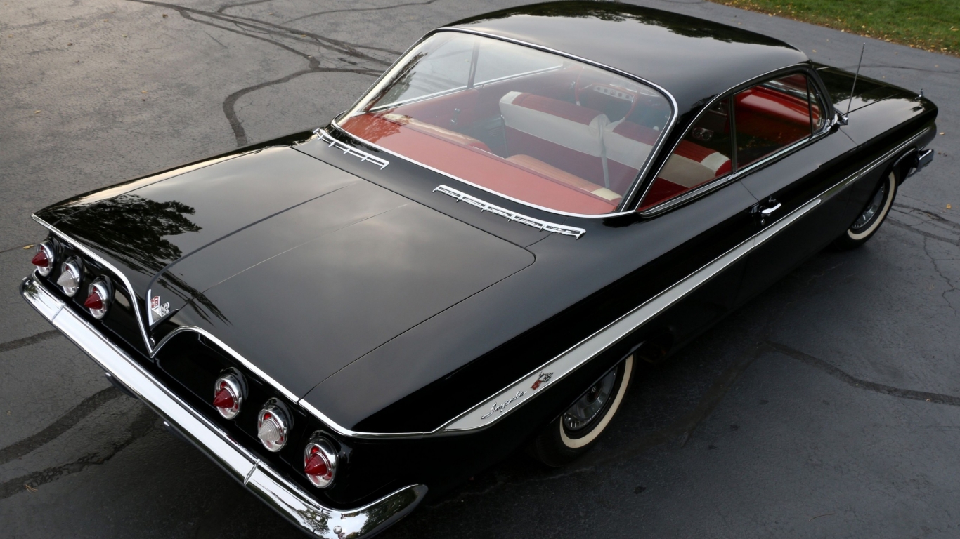 Black Chevrolet Impala 1961 for 1366 x 768 HDTV resolution