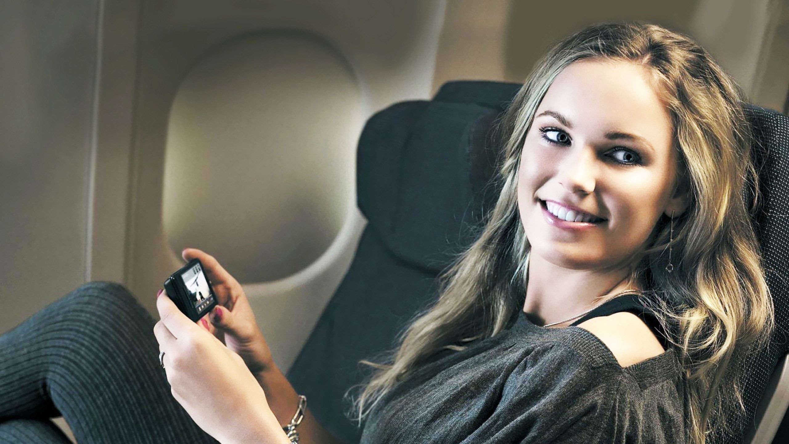 Caroline Wozniacki Airplane for 2560x1440 HDTV resolution