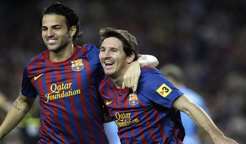 Cesc Fabregas and Lionel Messi for 1024 x 600 widescreen resolution