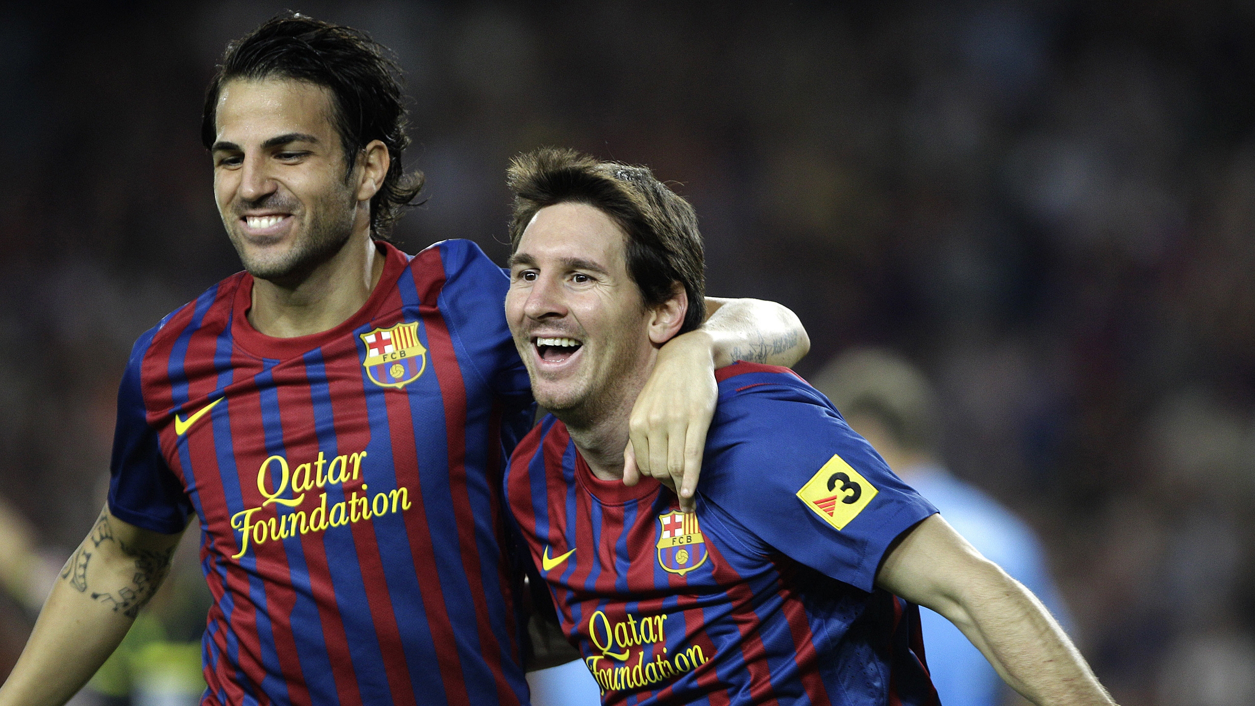 Cesc Fabregas and Lionel Messi for 2560x1440 HDTV resolution