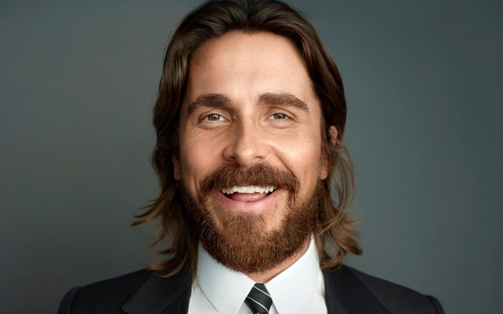 Christian Bale in Suit for 1680 x 1050 widescreen resolution