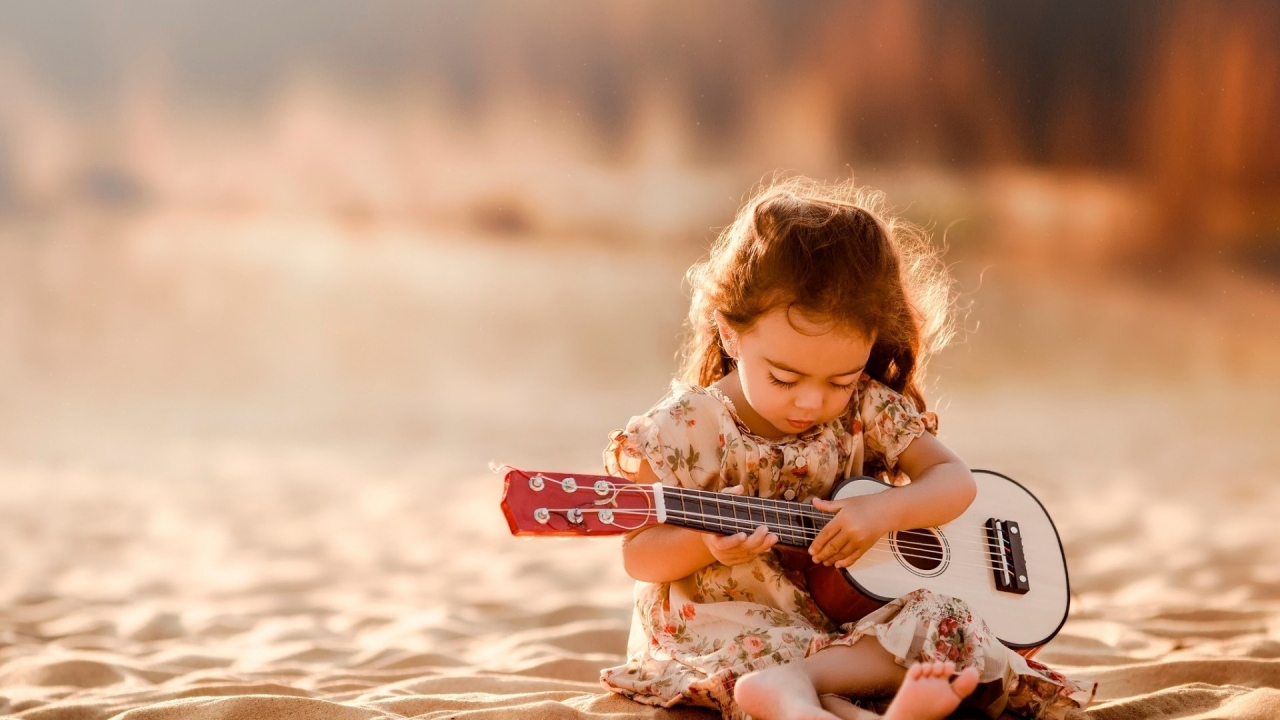 Cute Little Girl Playing Guitar for 1280 x 720 HDTV 720p resolution