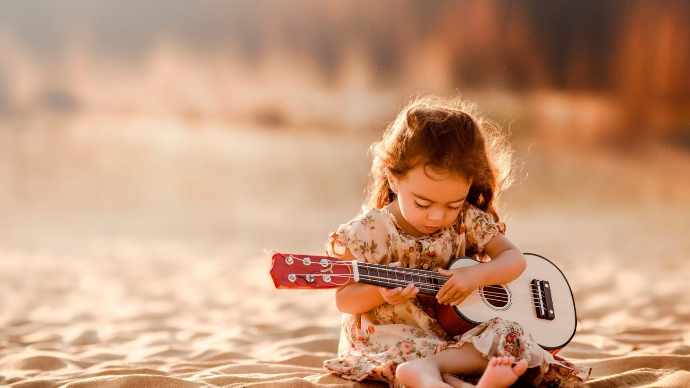 Cute Little Girl Playing Guitar for 1366 x 768 HDTV resolution