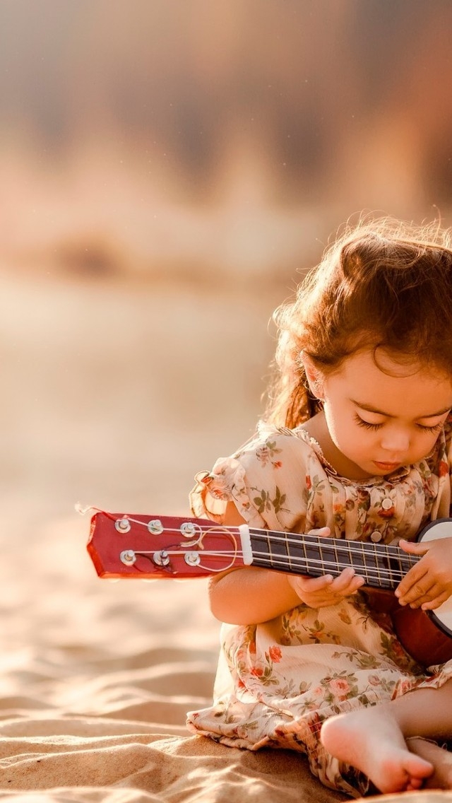Cute Little Girl Playing Guitar for 640 x 1136 iPhone 5 resolution