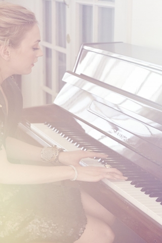 Emily Kinney Playing Piano for 320 x 480 iPhone resolution