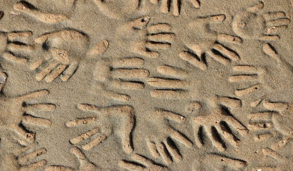 Handprints in the Sand for 1024 x 600 widescreen resolution