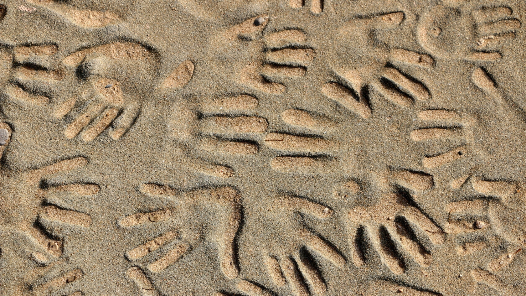 Handprints in the Sand for 1680 x 945 HDTV resolution