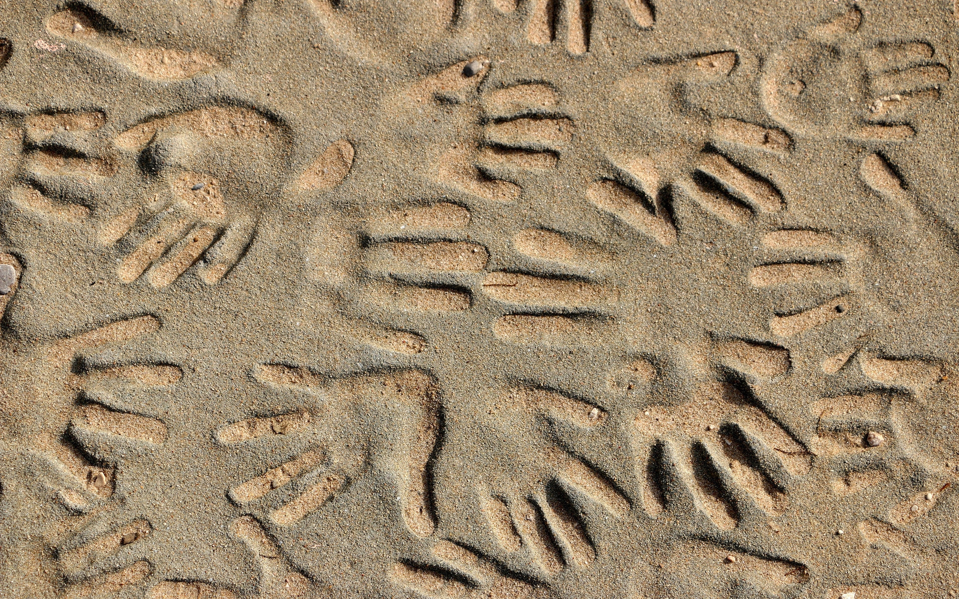 Handprints in the Sand for 1920 x 1200 widescreen resolution