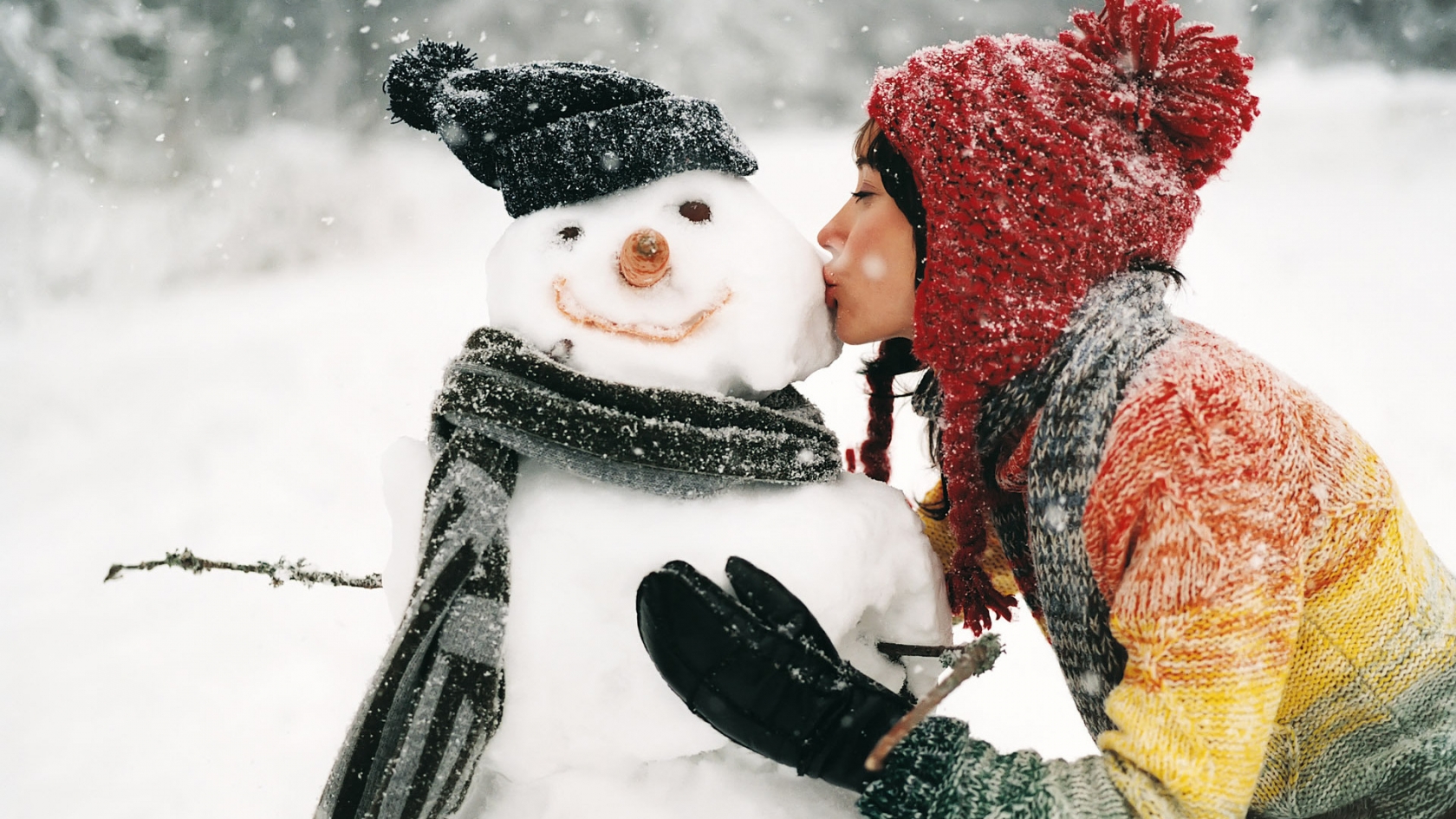 Kissing the Snowman for 1680 x 945 HDTV resolution