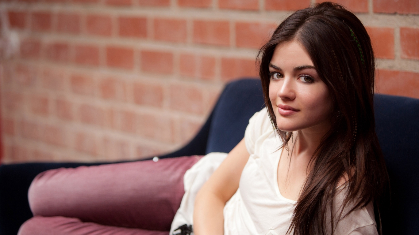 Lucy Hale Relaxing for 1366 x 768 HDTV resolution
