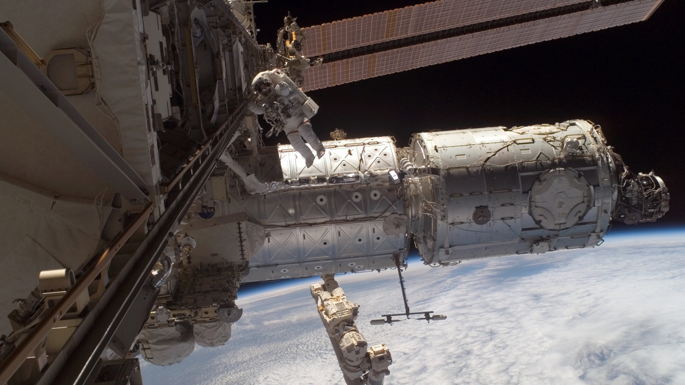 Man on Space Station for 1366 x 768 HDTV resolution