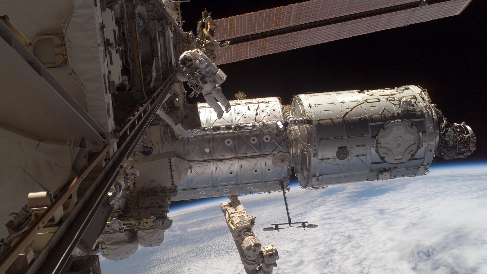 Man on Space Station for 1680 x 945 HDTV resolution