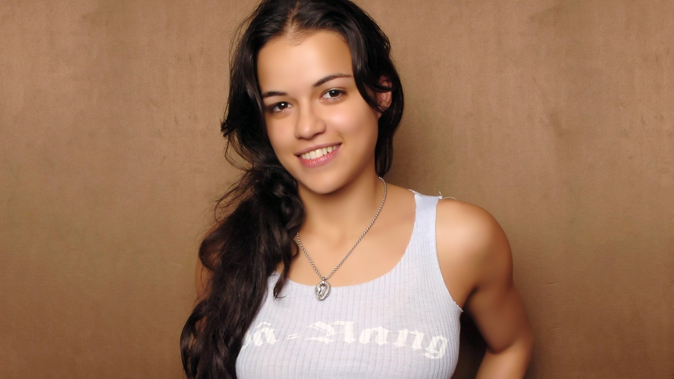 Michelle Rodriguez Smiling for 1366 x 768 HDTV resolution