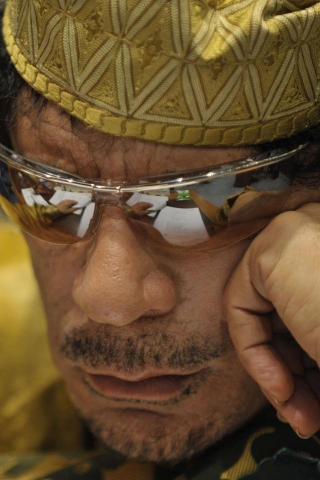 Muammar al Gaddafi for 320 x 480 iPhone resolution