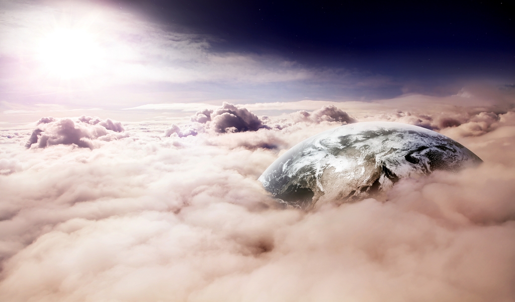 Planet between clouds for 1024 x 600 widescreen resolution