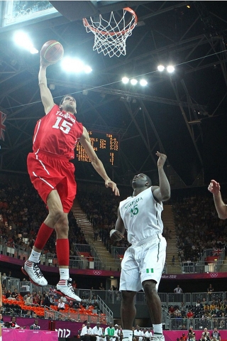 Salah Mejri of Tunisia dunks against Nigeria for 320 x 480 iPhone resolution