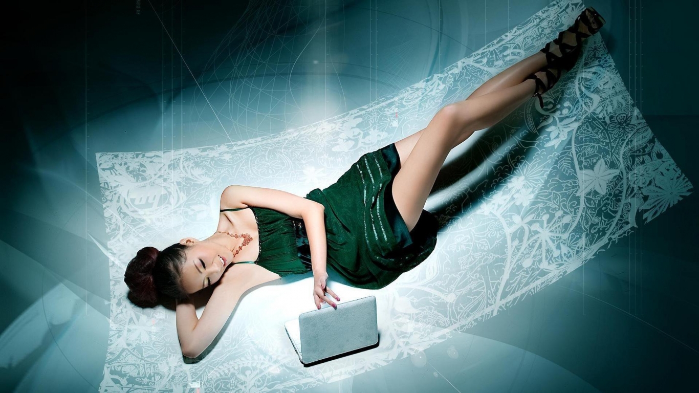 Sexy Woman with Laptop for 1366 x 768 HDTV resolution
