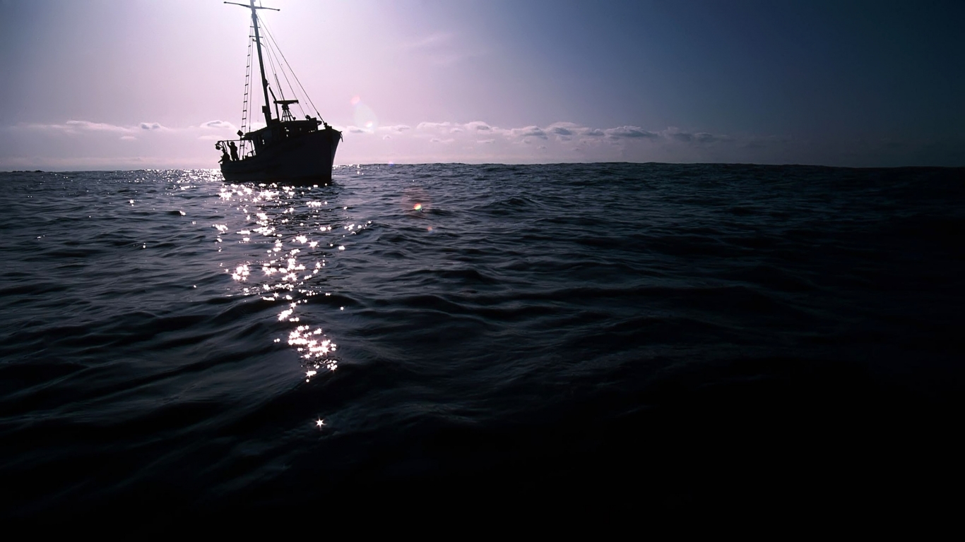 The Dark Boat on Sea for 1366 x 768 HDTV resolution