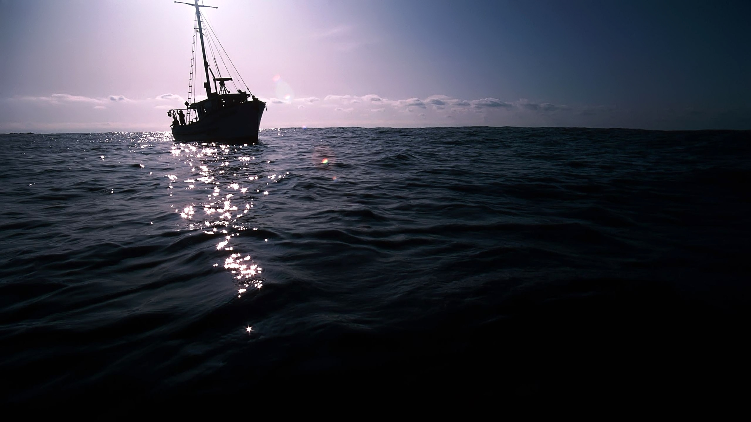 The Dark Boat on Sea for 2560x1440 HDTV resolution