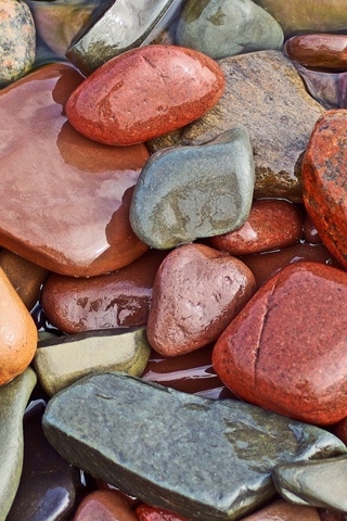 Wet colourful rocks for 320 x 480 iPhone resolution