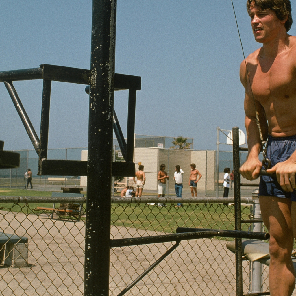 Young Arnold Schwarzenegger Workout for 1024 x 1024 iPad resolution
