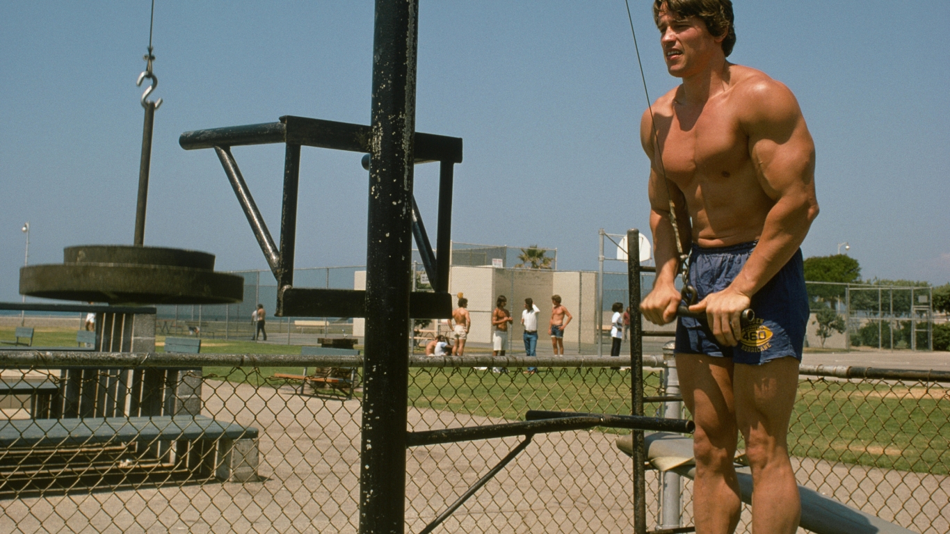 Young Arnold Schwarzenegger Workout for 1366 x 768 HDTV resolution